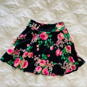 Black stretchy floral flower print pink rose print mini skirt